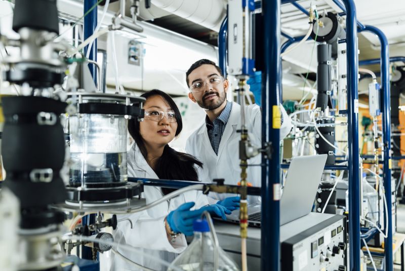 Students in a lab in PPE gear